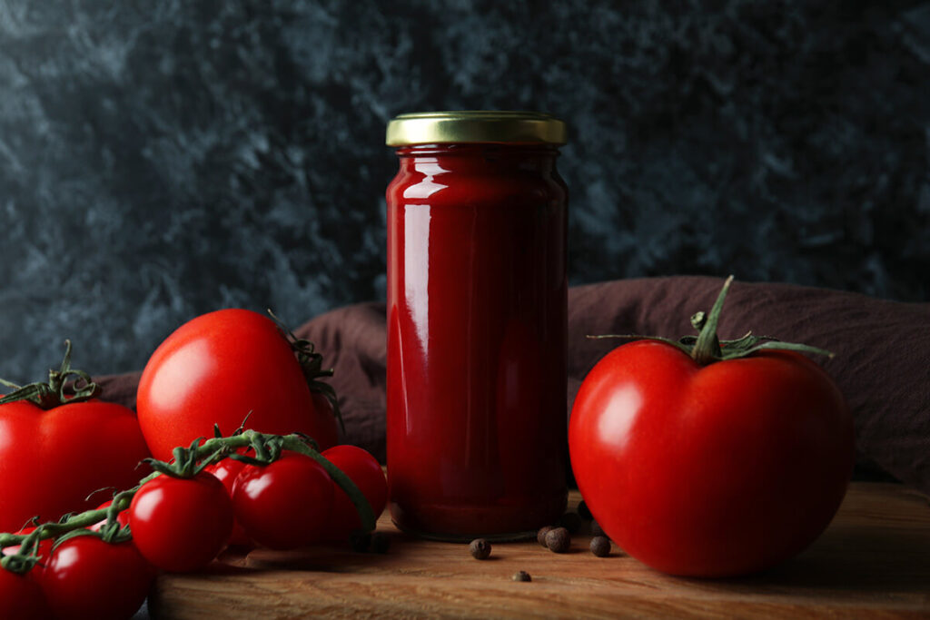 Canned tomato sauce as an example of food preservation.