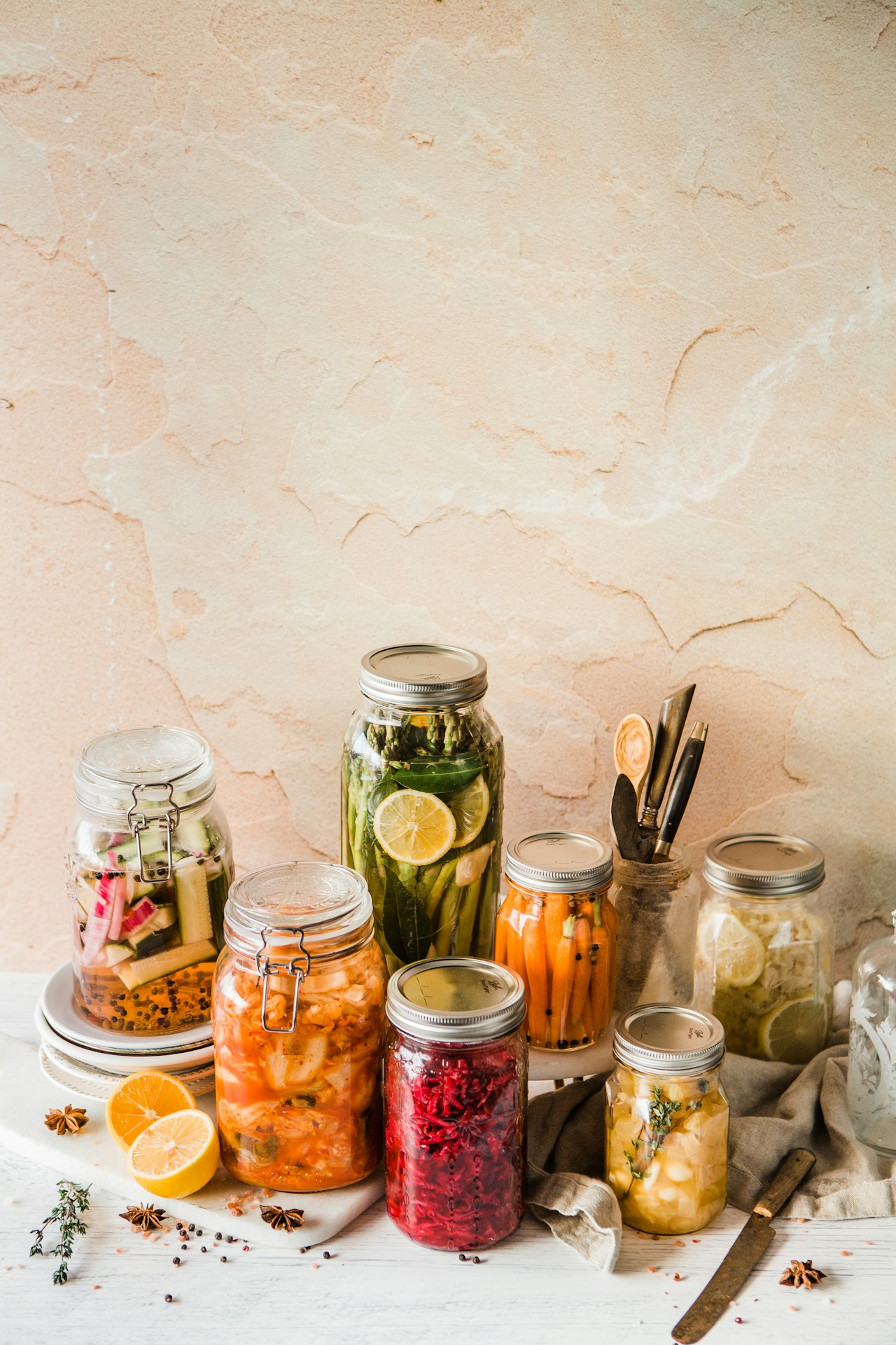 an example of various vegetables being stored long term through food preservation techniques.